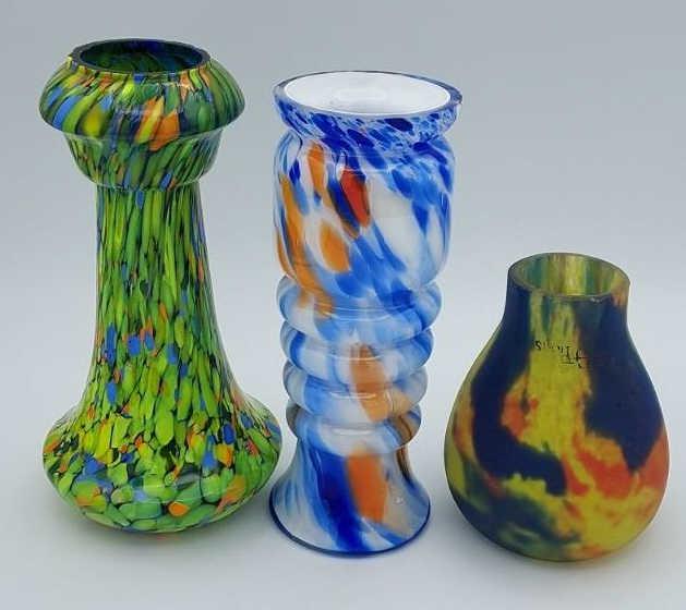 Three (3) Colorful Art Glass Vases: Set of three art glass vases. One Blue,orange and white spatter patern vase marked Made in Japan on base, 7.5" tall. One Czech art glass Green, orange and blue spatter pattern vase, 7.75" tall. One sh