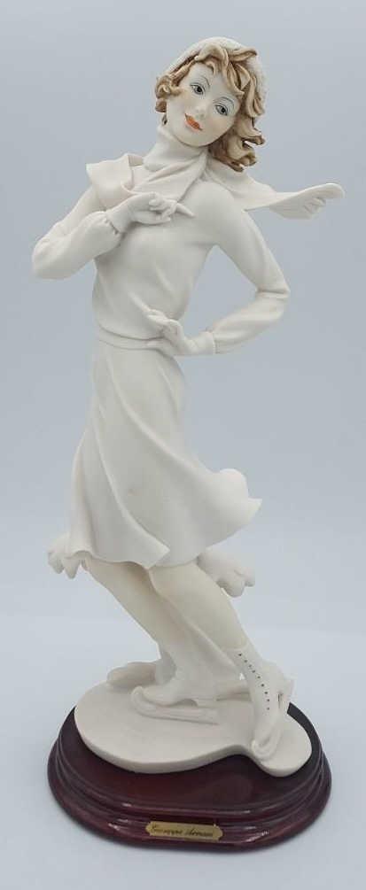 Giuseppe Armani Ice Skating Girl Figurine: Giuseppe Armani Figurine Ice Skating Girl, 0913F. Florence 1992. Capodimonte marked "N." Nice condition. Made in Italy. Marked with "N" trademark. Measures 13" tall, 5.5" across.