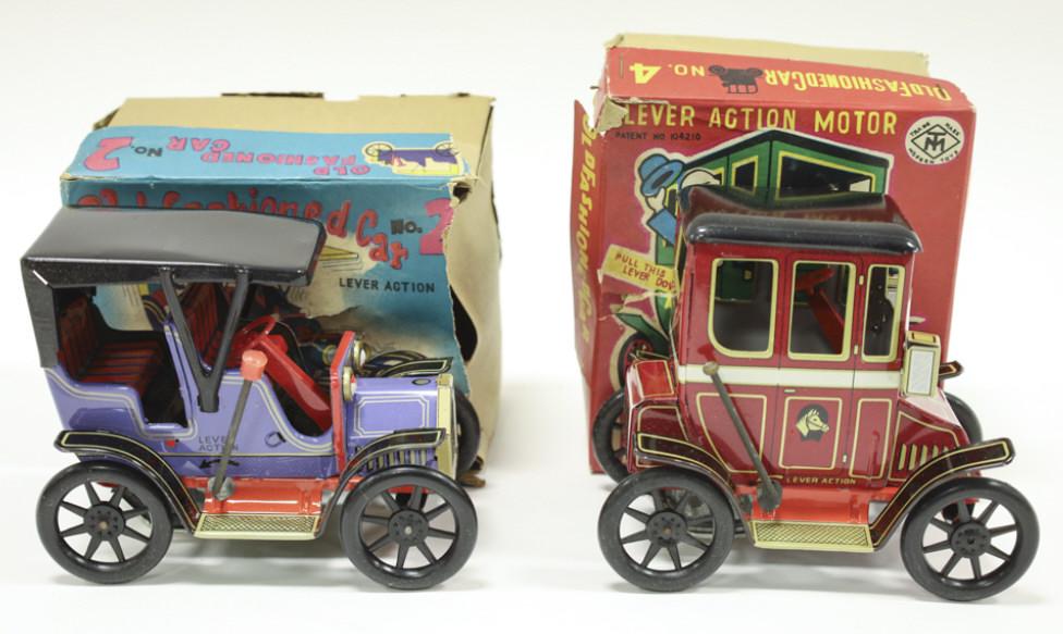 (2) 1950s Modern Toys Old Fashioned Tin Toy Cars: Two 1950s Modern Toys Japan Old Fashioned Cars, No. 2 & 4. Lever Action motor tin toys. Original boxes have wear, toys in nice condition.