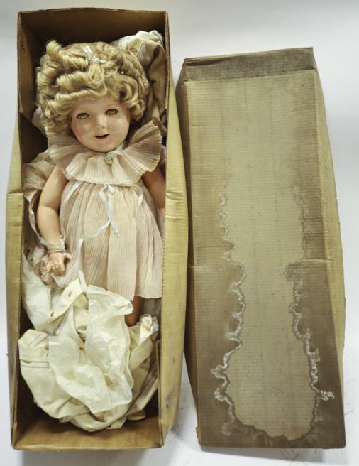 Ideal Shirley Temple Composotion Doll: Ideal Shirley Temple Composotion Doll. Doll wearing the "Baby Take A Bow" dress. Sleep eyes, open mouth with top teeth. Applied top lashes and paintied bottom lashes and eyebrows. Marked on Back of ne