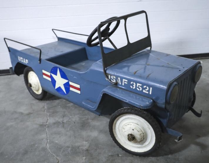 1950 Military U.S. Airforce Jeep Pedal Car: Vintage Military United States Airforce Jeep Pedal Car. Car has wear and paint loss from age and use. Measures approx 40" long.