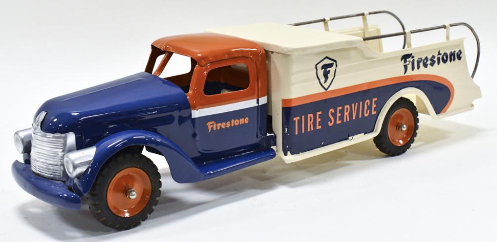 Custom Buddy L Firestone Tire Service Truck: Custom Buddy L Firestone tire service truck. Displays very well with Firestone decals and great color. Good condition with some wear to the decals from storage and display. Measures approximately 24" 