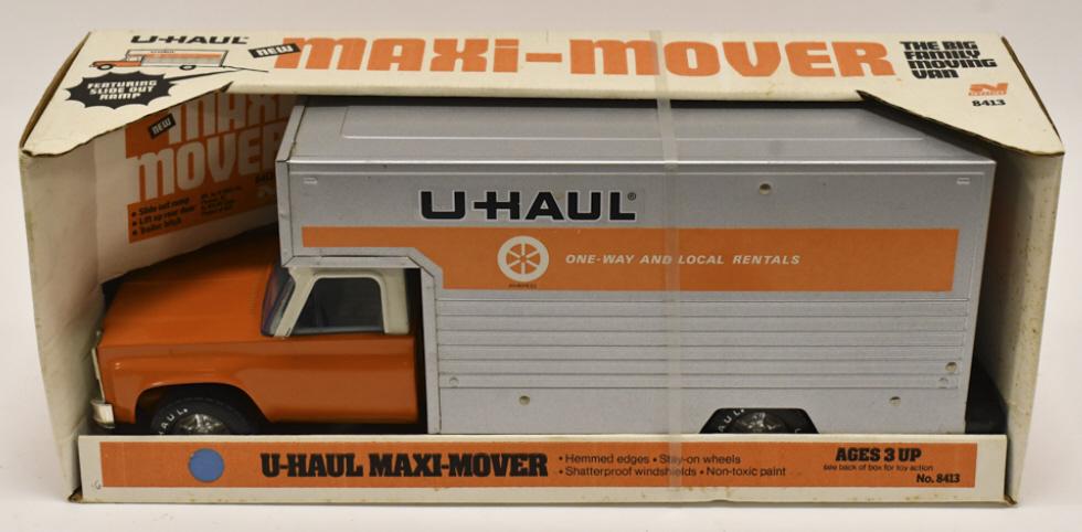 Nylint U-Haul Maxi-Mover Box Van Truck In Box: Nylint U-Haul Maxi-Mover box can truck in the original box. Good condition new in the box. The box has some staining, and the truck has some light dust from storage. The box still has the tie strap on