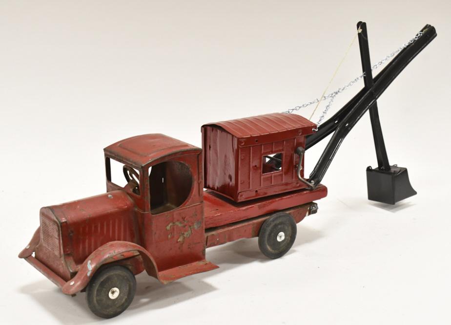 Custom Emmets Toy Steam Shovel Truck: Custom Emmets Toy steam shovel truck. The truck appears to be mostly original except for the crane. The crane appears to be added. Displays well. Measures approximately 28" long.