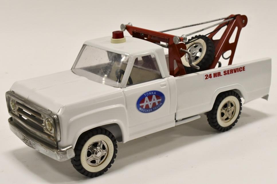 Restored Tonka Dodge 24 HR Service Wrecker Truck: Restored Tonka Dodge AA 24 hour service wrecker tow truck. Good condition with a couple paint chips and wear from storage and display. Measures approximately 14" long.