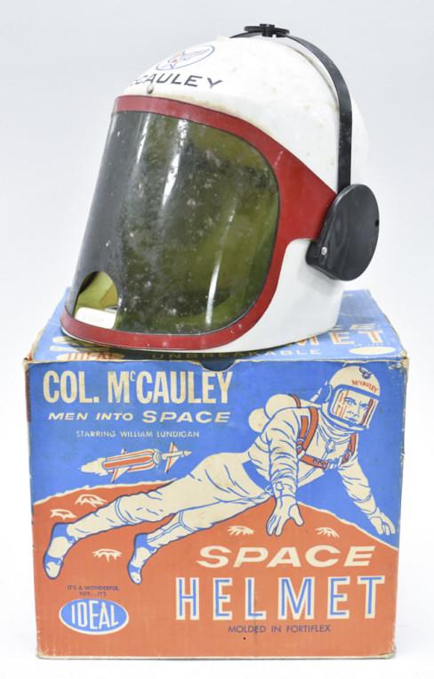 Ideal Toys Col. McCauley Space Helmet In Box: Vntage Ideal Toys Col. McCauley space helmet with the original box. The helmet has dirt and wear from use and storage. The box is square, but does have staining and wear from storage. Measures approxi