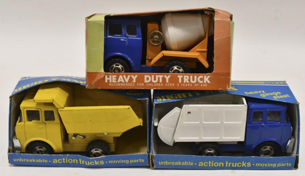 Mighty Marx Cement Mixer, Dump & Garbage Truck: Mighty Marx cement mixer truck, dump truck, and garbage truck in the boxes. The trucks have some scuffs and wear from storage and display. Each measures approximately 7" tall.