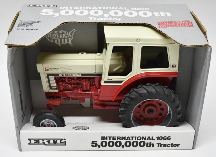 1/16 Ertl International 1066 5 Millionth Tractor: 1/16 scale Ertl International Farmall 1066 5 millionth tractor with cab. Good condition new in the box. The smoke stack is inside the box.