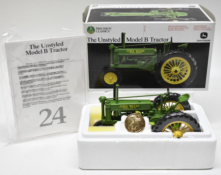 1/16 Ertl John Deere Unstyled Model B Tractor: 1/16 scale Ertl John Deere Unstyled Model B Tractor. Precision Classics Series #24. Good condition new in the box! Comes with the pamphlet and medallion.