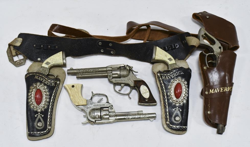 Lot Of Maverick Cap Guns Some w/ Holsters: Lot includes (4) Leslie-Henry Maverick cap guns (includes two different styles), and one unkown maker Maverick cap gun. Also comes with a dual Maverick holster, and single Maverick holster. The guns h