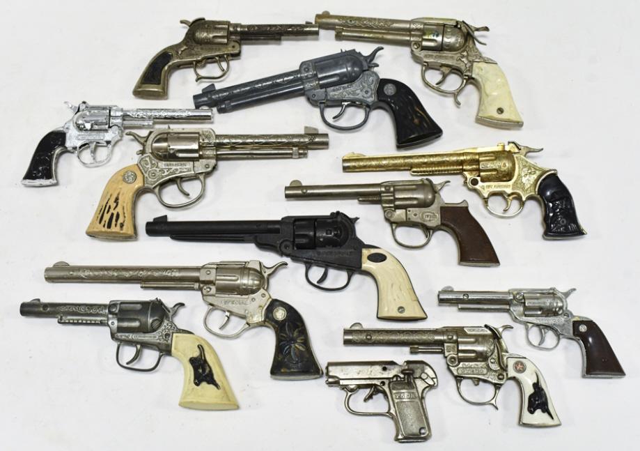 Lot Of Hubley, Leslie Henry, & Kilgore Cap Guns: Lot of Hubley, Leslie Henry, Kilgore, and Nichols cap guns. Includes Special, Billy The Kid, Kit Carson, Davy Crocket, Tophand 50, 250 Shot, and more!. All have wear from use and age. Some are damaged