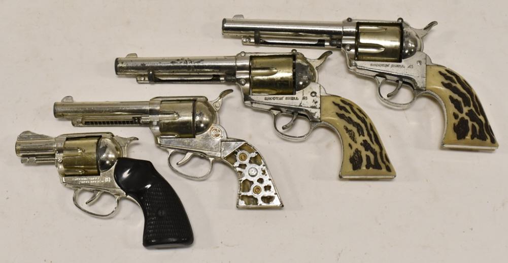 Mattel Shootin Shell 45, Snub Nose 38 & Fanner: Lot includes (2) Mattel Shootin Shell 45's, Shootin Shell Snub-Nose 38, and Shootin Shell Fanner cap guns. All have wear from use and age. The fanner is missing half of the grips, and one of the 45's 