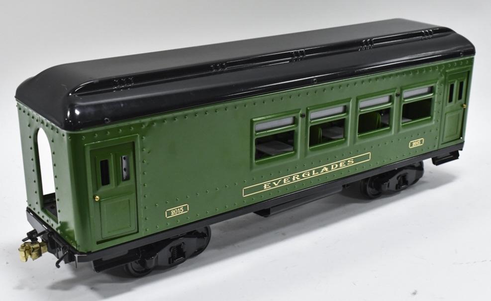 T-Reproductions Buddy L Everglades Dining Car: T-Reproductions Buddy L Everglades #2015 Dining car. Good condition with a couple scuffs and storage wear. The doors open. Measures approximately 26" long.