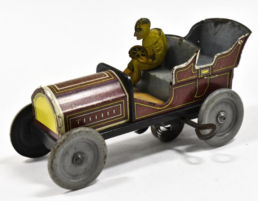 Early Hess Tin Windup Automobile w/ Man (1 of 6)