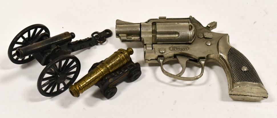 Hubley Trooper Cap Gun & (2) Cannons: Hubley Trooper cap gun, Ford Frederica National Monument cannon replica, and Civil War style cannon. The cap gun doesn not work. The cap gun measures approximately 5-3/4" long.
