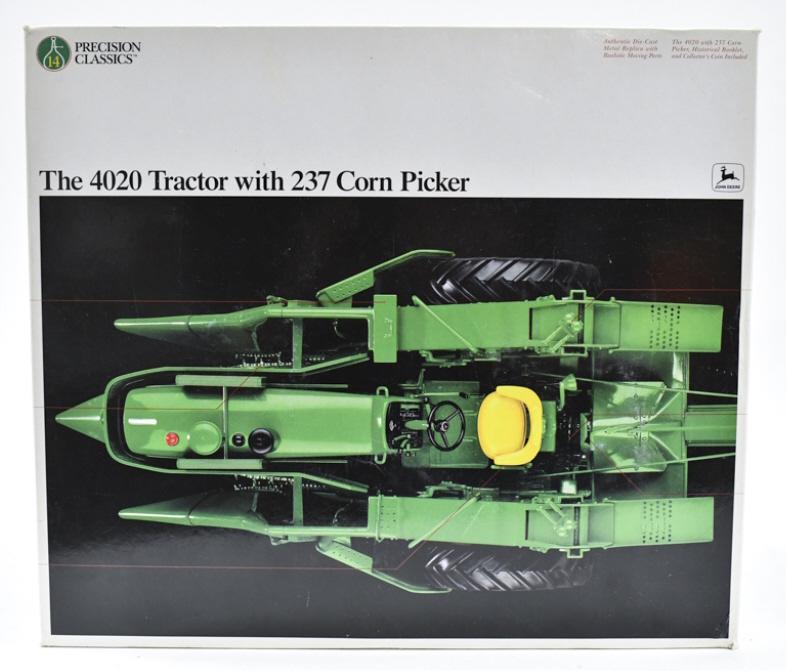 1/16 Ertl John Deere Model 4020 Tractor w/ Picker: 1/16 scale Ertl John Deere Model 4020 tractor with 237 corn picker Precision Classics series #14. Good condition new in the box. The box has some storage wear.
