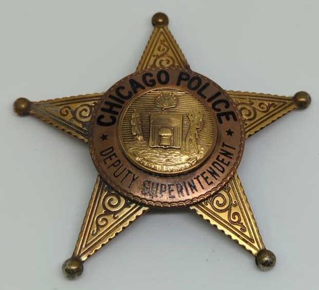 Obsolete Chicago Police Deputy Superintendent Badg: 3" 5-pt star gold-tone and copper badge.
