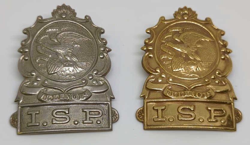 Pair of Obsolete Illinois State Police Cap Badges. (1 of 2)