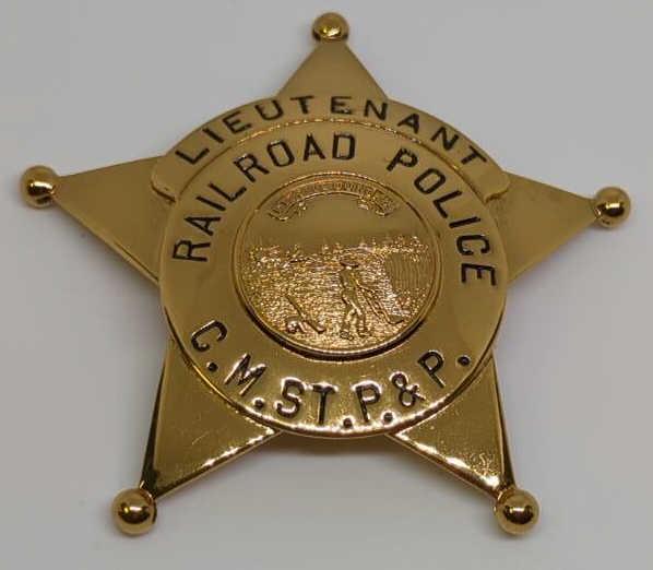 Obsolete C.M.St P & P Railroad Police Badge: 2.75" gold tone 5pt star badge, marked CH Hanson on back. Chicago, Minneapolic, St Paul and Pacific Railroad Lieutenant Badge.