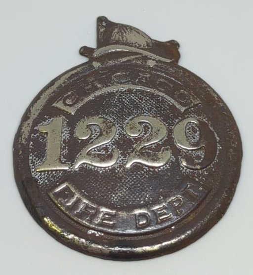 Early Chicago Fire Dept Helmet-Top Badge #1229: Embossed 2.25" obsolete badge