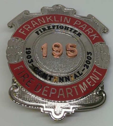 Obsolete Franklin Park Fire Dept 2003 Centennial: Badge #195 silver shield badge w/enameled trim and copper numbers. Marked Blackinton on the back. 2.5"
