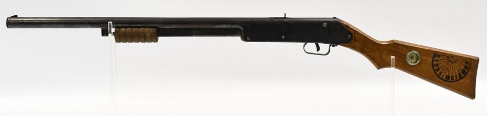 Daisy No. 107 Buck Jones Special BB Gun Air Rifle: Vintage Daisy model no. 107 Buck Jones Special air BB rifle with pump action. The gun has pitting , plate loss, and wear from use and age. Displays well with compass in wood stock. Overall it measures