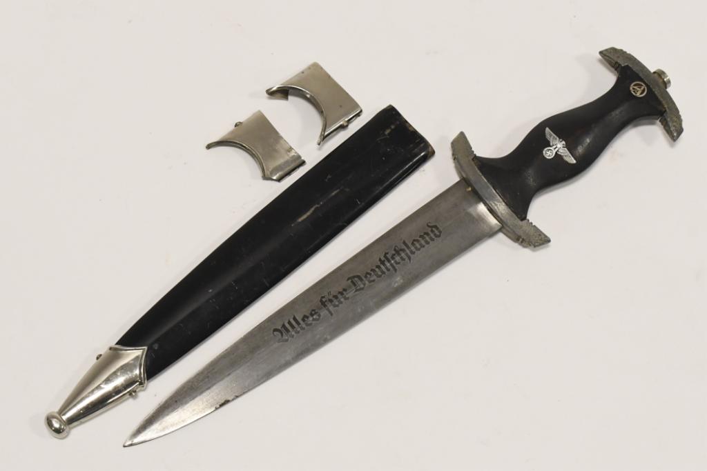 WWII German NSKK Dagger With Scabbard: WWII German NSKK Dagger with scabbard. Dagger blade is marked "RZM M7/14". Blade has " Uillis Fur Deutschland" engraved down it. Appears to be in overall fair condition with plate loss, pitting on bla