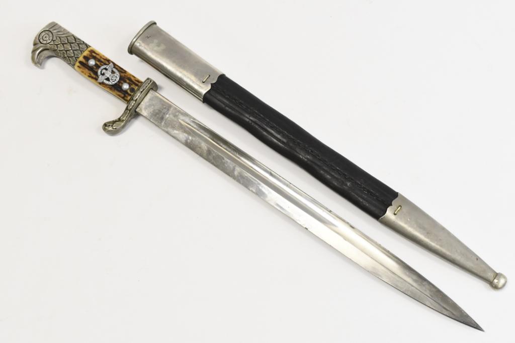 WWII German Police Dress Bayonet with Stag Grip: WWII German Police Dress Bayonet with stag grips and leather sheath. Appears to be in overall good condition with plate loss, scratches, discoloration, and wear from use and age. Blade does have some 