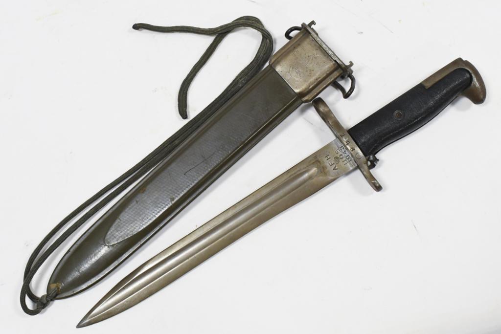 WWII US MIlitary M1 Garand Bayonet With Scabbard: WWII US Military M1 Garand bayonet with scabbard. Blade is marked ""AFH" "US" and dated 1943. Nice condition with wear from use and age. With scabbard it measures approximately 16" across. Blade measu