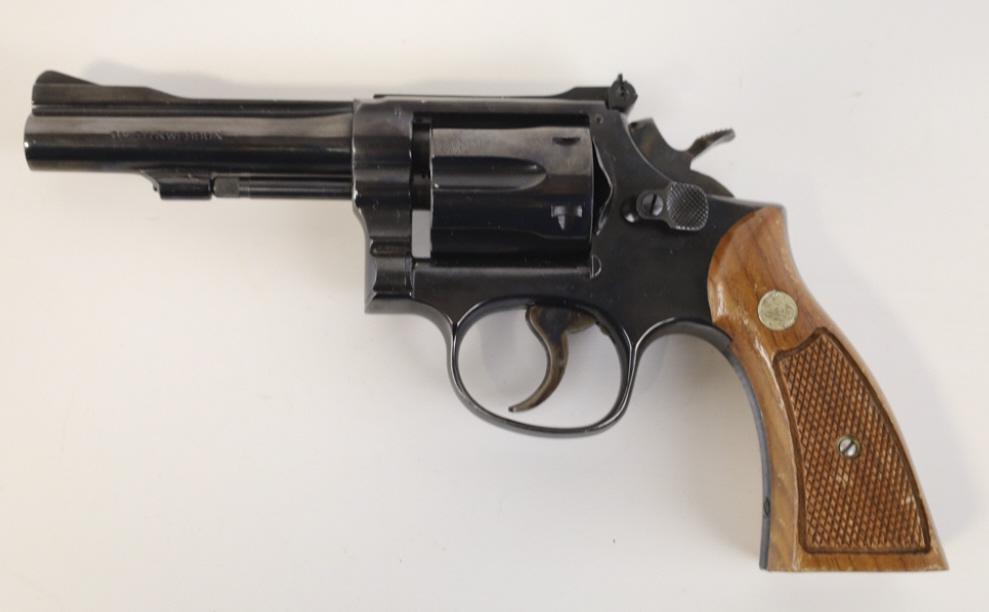 Smith & Wesson Model 18-3 .22 LR Revolver: Smith & Wesson Model 18-3 six-shot revolver in .22 Long Rifle. The blued revolver is in nice used condition and has a 4-1/8" barrel. SN: 15K4877. FFL required for transfer. (876-7)