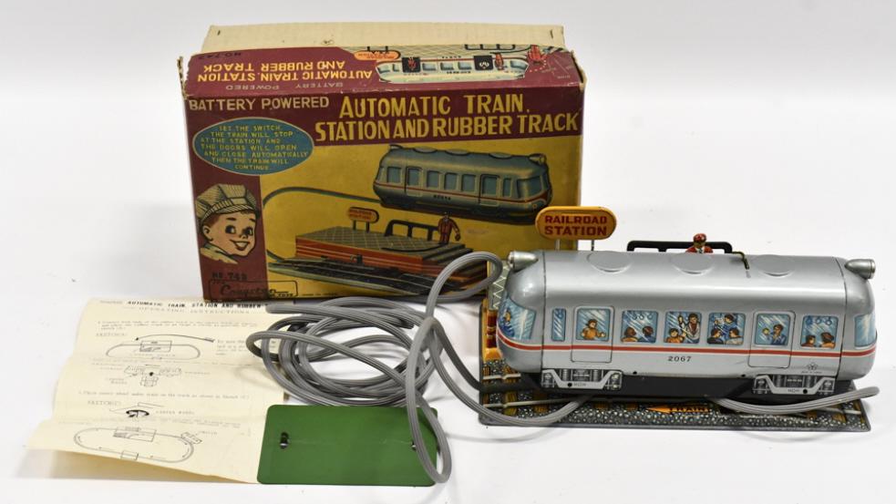 Japanese Tin Sears Exclusive Automatic Toll Gate.