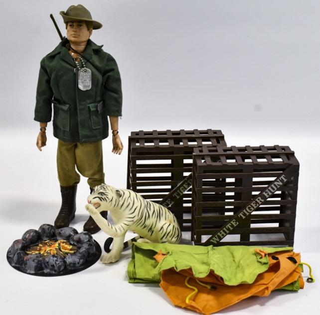 Vintage Hasbro GI Joe White Tiger Hunt Set: Vintage Hasbro GI Joe White Tiger Hunt set. The figure comes with (2) White Tiger hunt cages, tiger, campfire, tent (missing poles), and rifle. The figure is a talking GI Joe. It does talk, but it is 