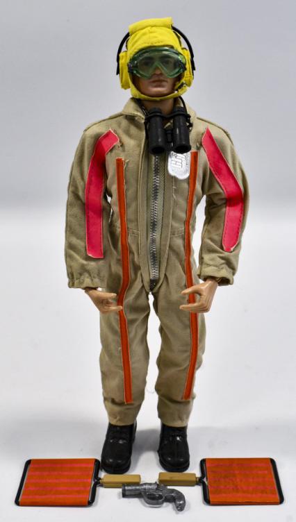 Vintage Hasbro GI Joe Landing Signal Officer: Vintage Hasbro GI Joe Landing Signal Officer. The set comes with signal paddles, flare gun, dogtag, and flare gun. The sweater has some fraying and wear from age. The figure has the usual stress crack