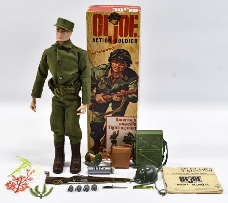 Vintage Hasbro GI Joe Action Soldier #7500 w/ Box: Vintage Hasbro GI Joe Action Sailor #7500 with the original box. The soldier comes with his helmet, cap, rifle, marine manual, and other accessories. The box has some wear around the edges. The staple