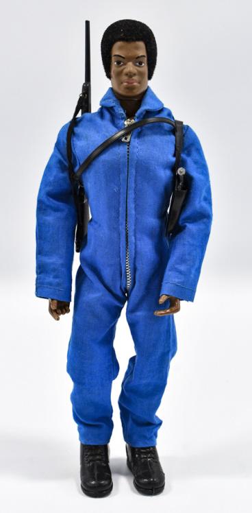 Vtg Hasbro GI Joe Black Adventurer w Blue Jumpsuit: Vintage Hasbro GI Joe Black Adventurer African American figure with blue jumpsuit. The blue jumpsuit appears to be from the Trouble at Vulture Pass set. The figure comes with shoulder holster with han