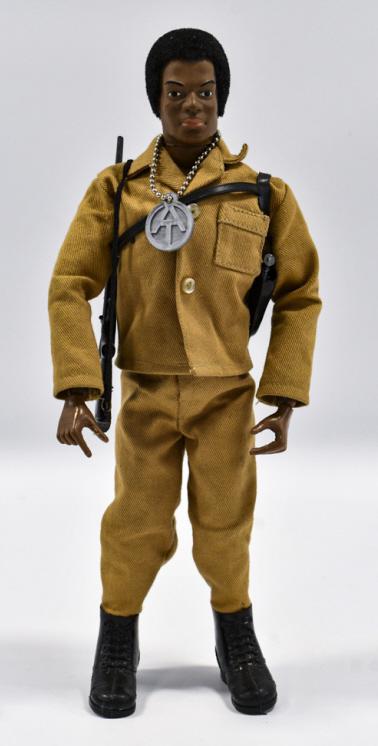 Vintage Hasbro GI Joe Black Adventurer Figure: Vintage Hasbro GI Joe Black Adventurer African American figure. The figure comes with rifle and shoulder holster with handgun. The figure has some small stress cracks around the joints.