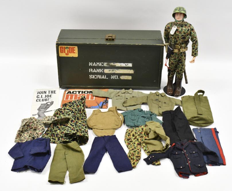 Vtg Hasbro GI Joe Figure w/ Footlocker & Outfits: Vintage Hasbro GI Joe figure with footlocker and outfits. The figure comes dressed with a camoflauge suit with handgun, rifle, helmet, dog tag, and canteen . The figure comes with some other outfits. 