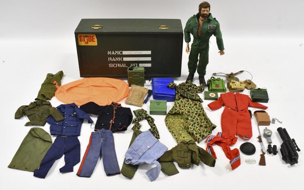 Vtg Hasbro GI Joe Figure w/ Footlocker & Outfits: Vintage Hasbro GI Joe figure with footlocker and outfits. The figure comes with rifle, field telephone, binoculars, and a few different outfits. The figure has hair loss and paint loss to his eyebrows