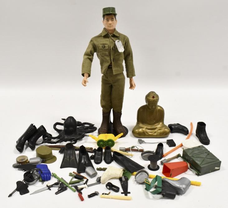 Vintage Hasbro GI Joe Figure With Accessories: Vintage Hasbro GI Joe figure with accessories. The accessories include boots, machete's, baton's, and a lot more. Some have wear from use and age. The figure has the soft head. The figure has some str