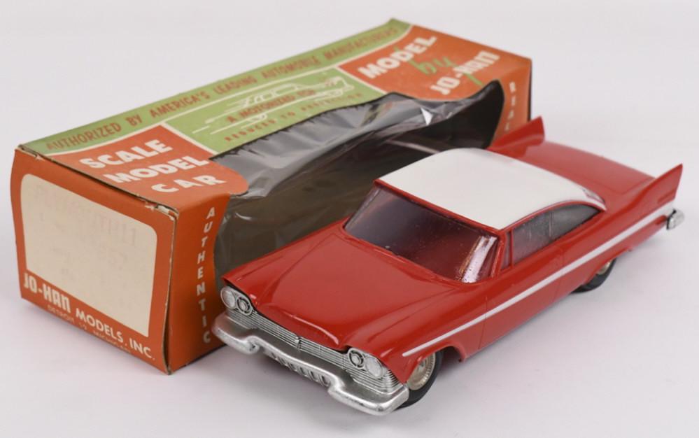 1957 Plymouth Belvedere Dealer Promo Car w/ Box: 1:25 scale original 1957 Plymouth Belvedere dealer friction promo car in original box by Jo-Han. Car appears to be in nice condition with some discoloration, expected warping, and wear from age and st