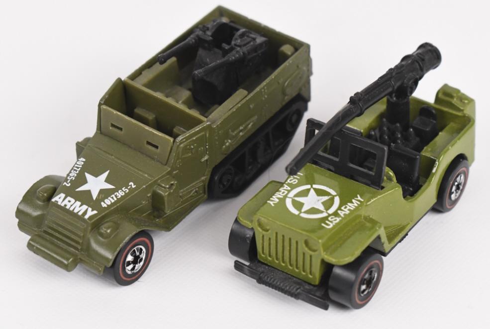Two Hot Wheels Redline Flying Colors Military: Two Hot Wheels Redline Flying Colors Military vehicles. Lot includes a Gun Slinger Jeep that appears to be in excellent to near mint condition with a few scattered micros. The other is a Gun Bucket ha