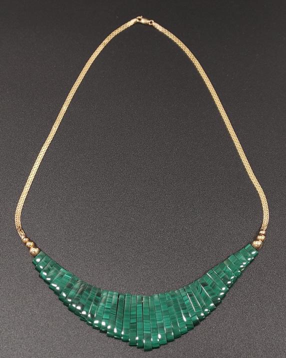 14K Yellow Gold Malachite Bib Necklace: 14K yellow gold and Malachite bib necklace. Gold beading has some denting and cracking. Measures 18" long. Weighs 39.7 grams