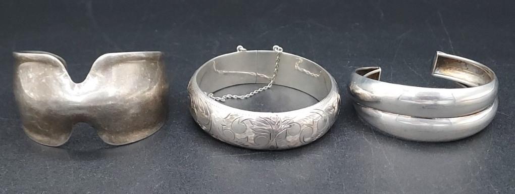 Lot of Three Sterling Silver Cuff Bracelets: Lot of Three Sterling Silver Cuff Bracelet. One Marked RLM Studios. Total weight 86.8 grams