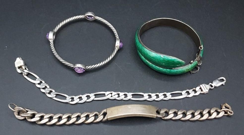 Lot of 4 Sterling Silver Bracelets: Lot of four sterling silver bracelets. Two bangle and two link bracelets. Total weight 117.4 grams.