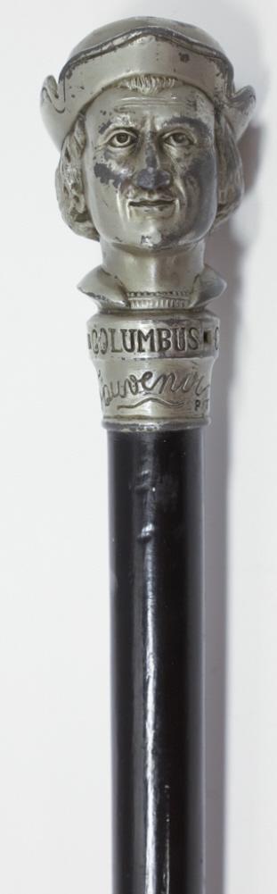 1893 World's Fair Columbus Bust Souvenir Cane: 1893 World's Fair Chicago Columbus cast metal bust Souvenir walking stick cane. 1892 Patten Date. Ebonized wood shaft and metal ferrule. Measures 34" long. Cane has some wear from age, use and storage