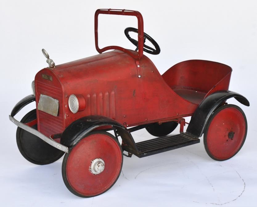 Repainted 1920's Steelcraft Cadillac Pedal Car: 1920's Steelcraft Cadillac pedal car. The car has an older repaint. Displays well with hood ornament, lights, and running boards. The car has wear from age. Measures approximately 37" long.