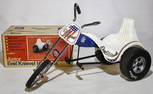 AMF Junior Evel Knievel Hot Seat Trike w/ Box: Vintage AMF Junior Evel Knievel hot seat trike with the original box. Nice condition with some decal wear and scuffs from age. The box has some staining, but overall pretty straight. The trike measure