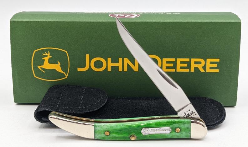 2003 Case XX John Deere Small Texas Toothpick: 2003 Case XX John Deere Small Texas Toothpick w/ Tin. Knife has John Deere branding badge on handle and green bone handles. Knife comes with hard tin case with paper sleeve and suade leather knife she