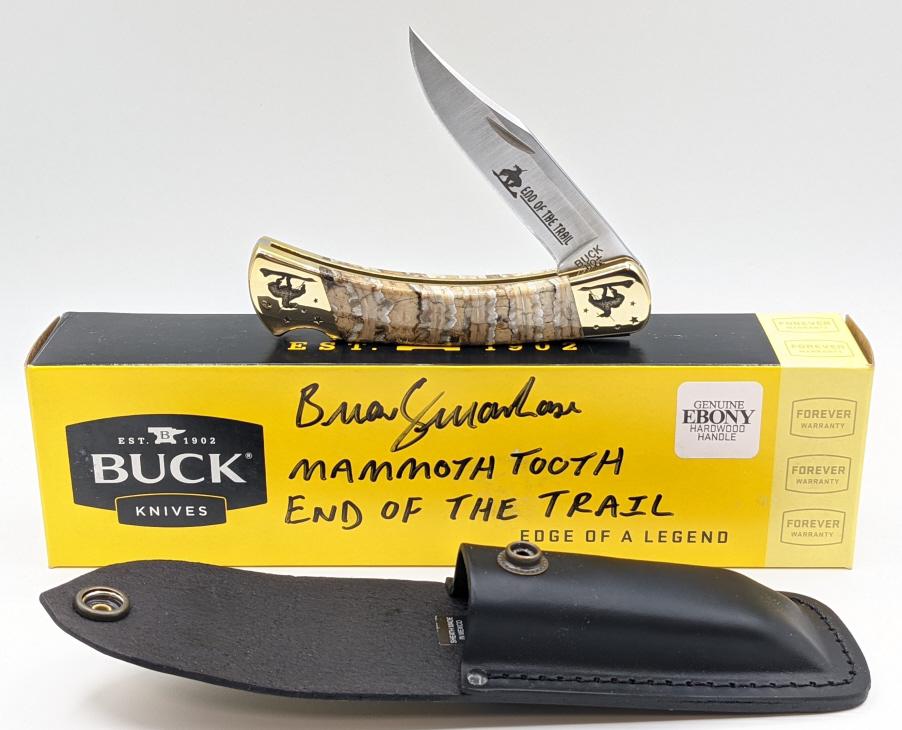 2022 Buck 110 End of the Trail Mammoth Tooth Knife: 2022 Brian Yellowhorse Buck 110 End of the Trail Edition Folding Hunter w/ Mammoth Tooth Scales. Knife is in like new condition with leather belt sheath and box. Knife features beautiful fossilized ma