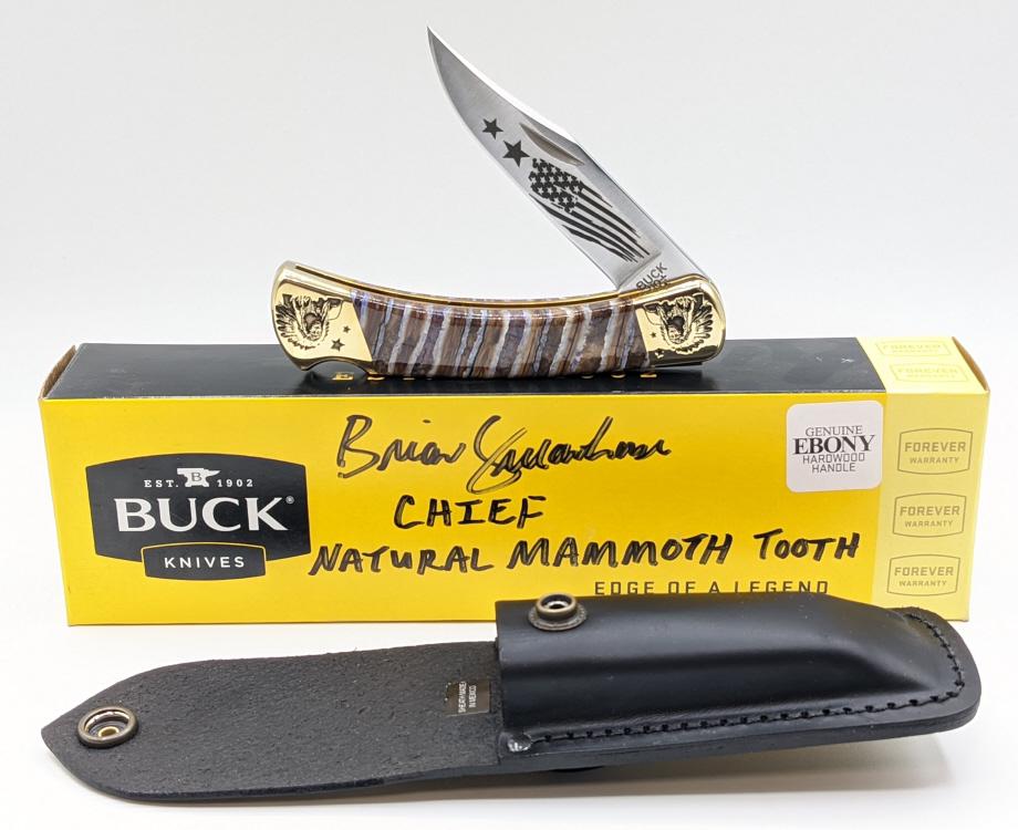 2022 Buck 110 Custom Chief Mammoth Tooth Knife: 2022 Brian Yellowhorse Custom Buck 110 Chief Edition Folding Hunter w/ Mammoth Tooth Scales. Knife is in like new condition with leather belt sheath and box. Knife features beautiful fossilized mammot